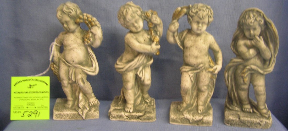 Group of four garden style cherubs: Group of four garden style cherubs $50.00-$75.00