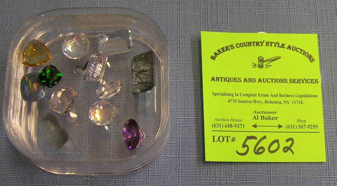 Group of assorted large cut gem stones: Group of 12 assorted large cut gem stones including morganite, citrine, chrome, diopside, etc. $125.00-$135.00
