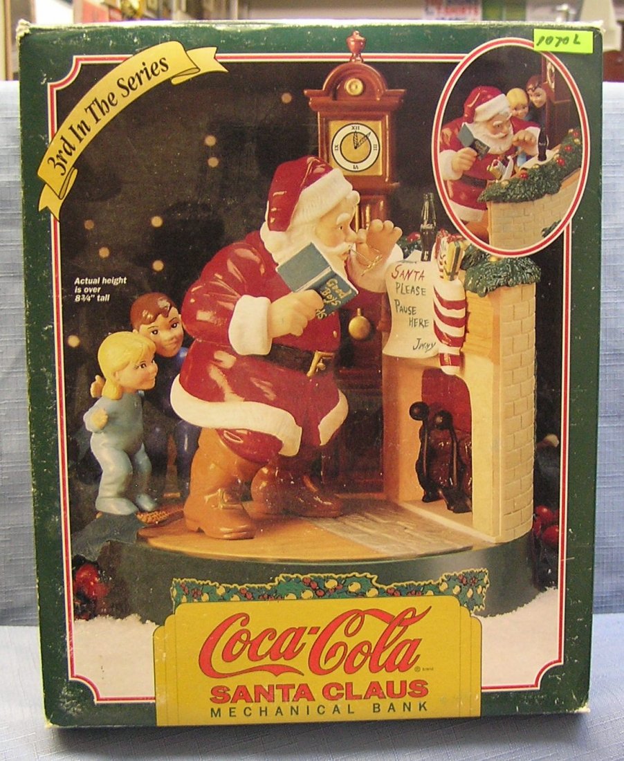 Vintage Coca Cola mechanical Santa Claus bank: Vintage Coca Cola mechanical Santa Claus mechanical bank with original box third in the series $125.00-$150.00
