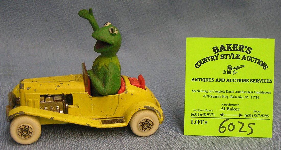 Vintage Kermit the Frog Muppets metal toy car and: Vintage Kermit the Frog Muppets metal toy car and figure $35.00-$40.00