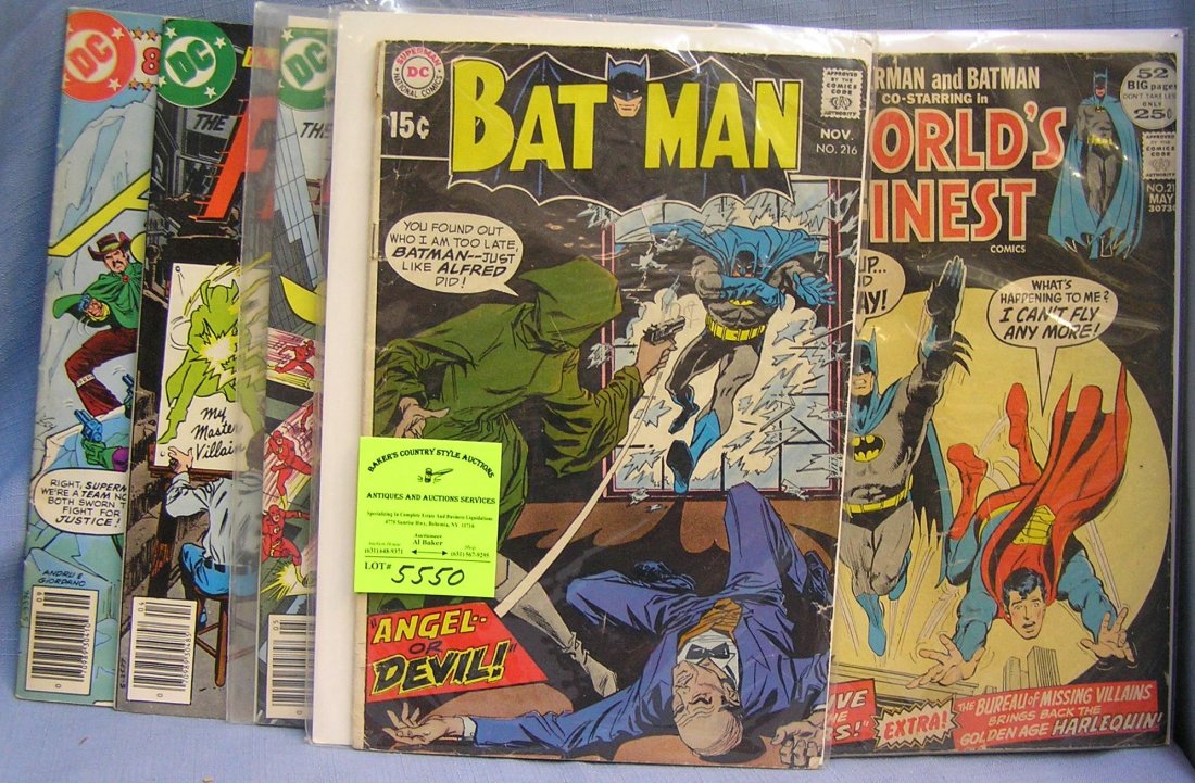 Group of early superhero comic books: Group of early superhero comic books featuring Batman, Superman, Shazam and Flash $50.00-$60.00