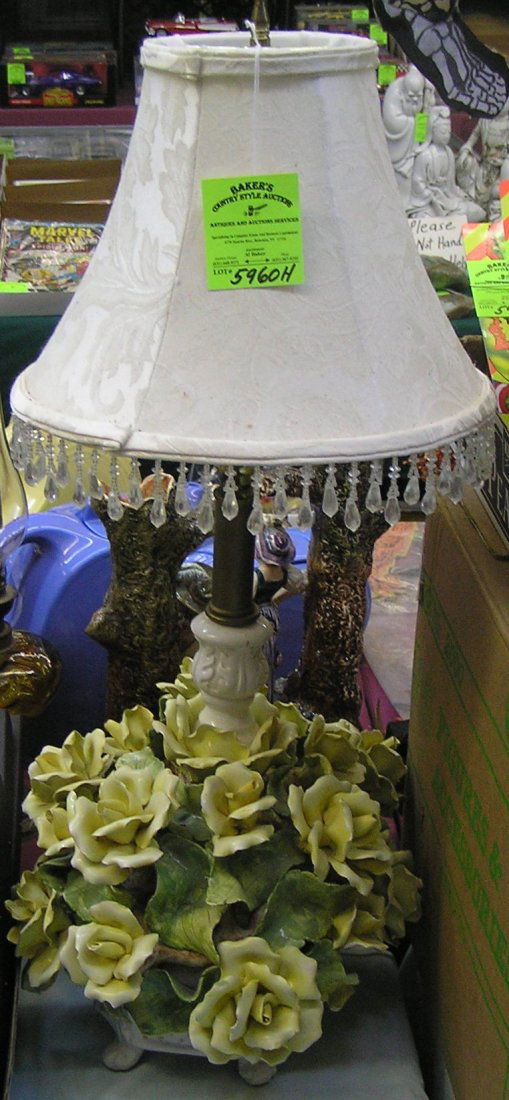 Vintage floral Capodimonte table lamp: Vintage floral Capodimonte table lamp with high quality silk shade with tassels lamp has some chips to flowers otherwise OK $150.00-$200.00