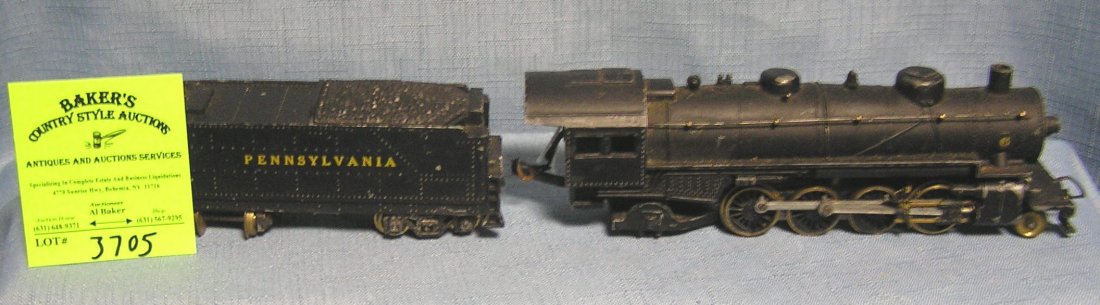Vintage cast metal engine and coal tender: Vintage cast metal engine and coal tender est. value $150.00-$200.00