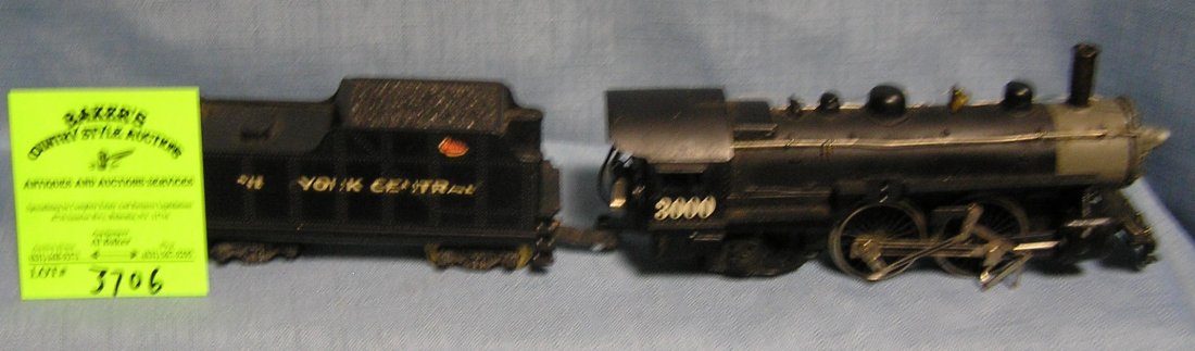 Vintage cast metal engine and coal tender: Vintage cast metal engine and coal tender est. value $150.00-$200.00