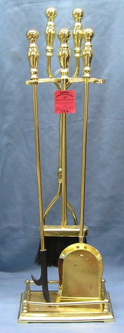 Solid brass fireplace tool set and holder: Solid brass fireplace tool set and holder est. value $125.00-$150.00