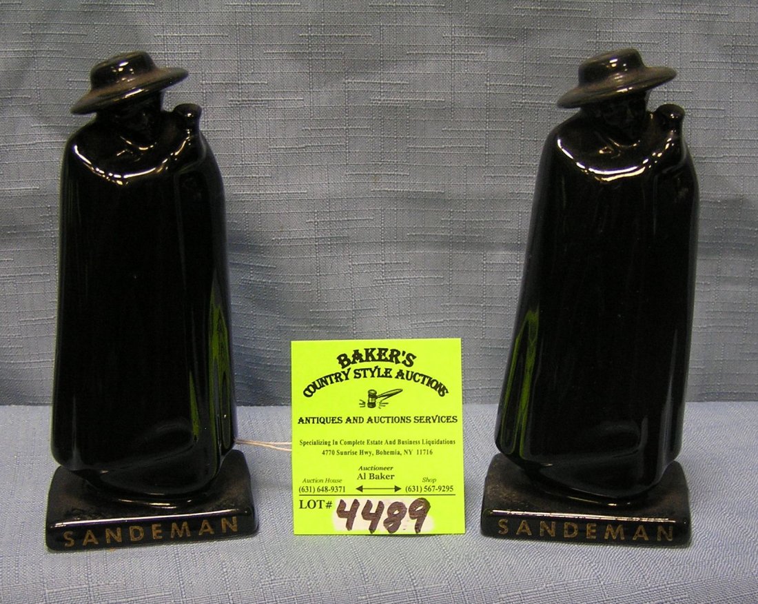 Pair of vintage Sandman advertising salt and pepper: Pair of vintage Sandman advertising salt and pepper shakers $40.00-$50.00