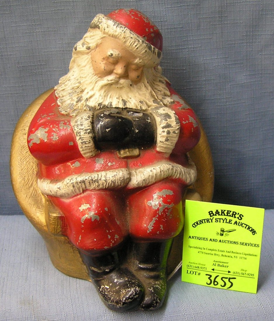 Vintage hand painted cast metal sleeping Santa Claus: Vintage hand painted cast metal sleeping Santa Claus bank est. value $100.00-$125.00