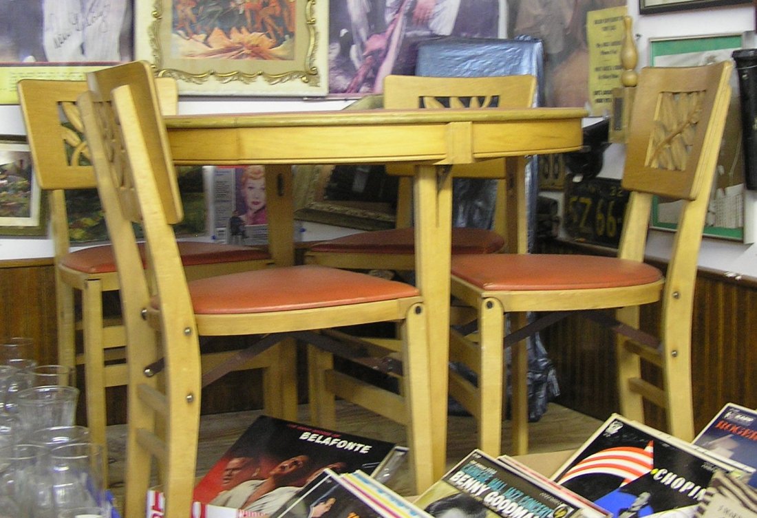 Vintage Maple table and chair set: Vintage 1950’s Maple table and chair set consists of collapsible table and four chairs and two leaves est. value $200.00-$250.00