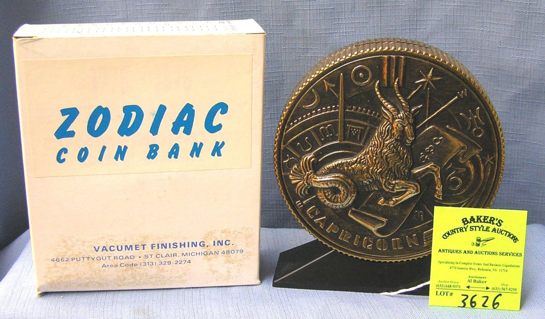 Vintage cast metal zodiac bank Capricorn with original: Vintage cast metal zodiac bank Capricorn with original box est. value $65.00-$75.00
