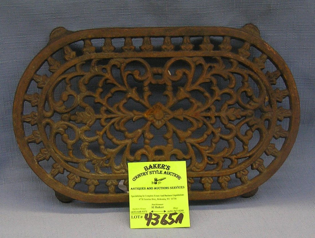 Large contemporary cast iron trivet: Large contemporary cast iron trivet circa 1960’s/70’s $40.00-$60.00