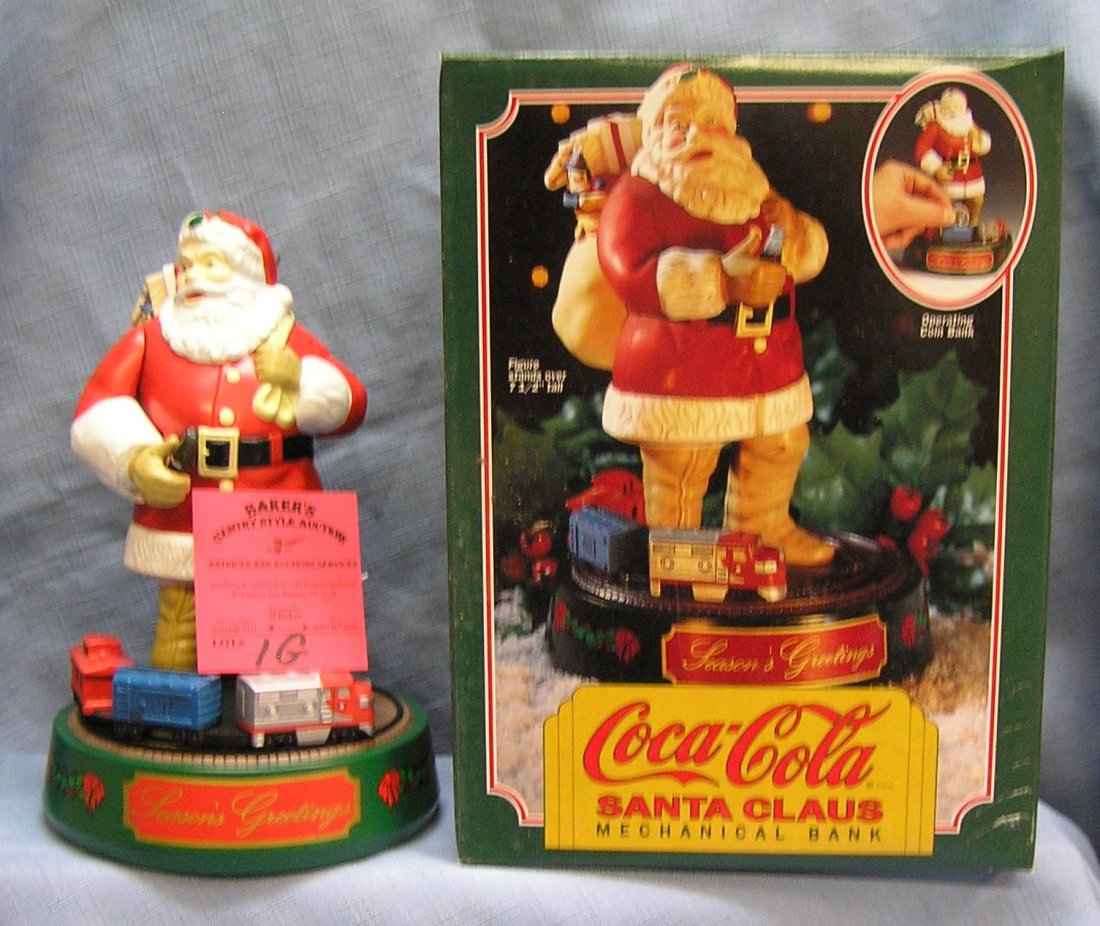 Vintage Coca Cola mechanical Santa Claus bank: Vintage Coca Cola mechanical Santa Claus and Lionel train set mechanical bank first in the series mint in original box $150.00-$175.00