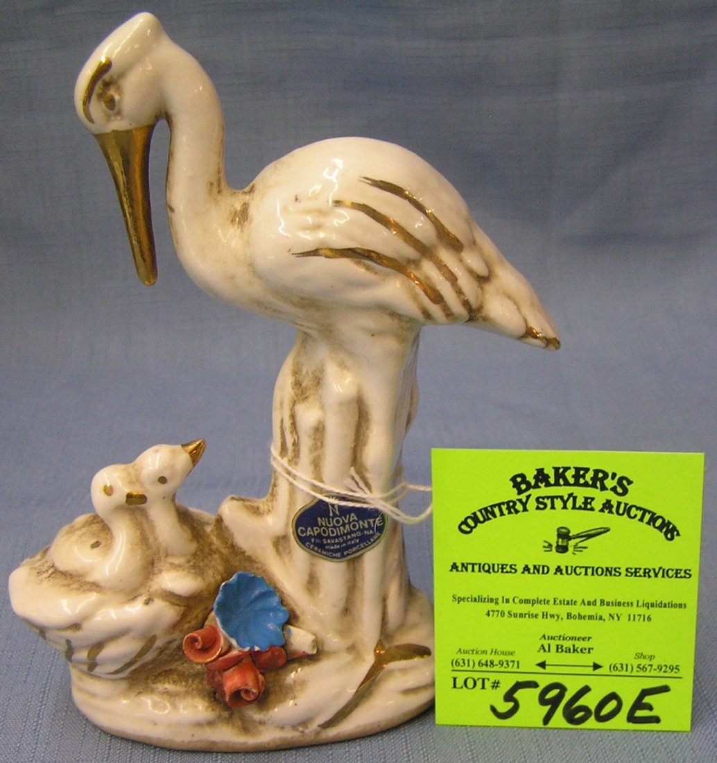 Vintage Capodimonte Pelican family figurine with: Vintage Capodimonte Pelican family figurine with original tags $50.00-$60.00