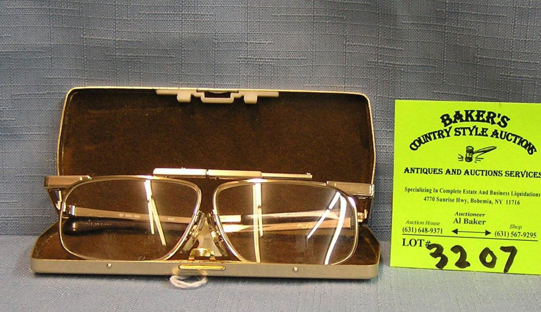 Pair of vintage high quality glasses in metal case: Pair of vintage high quality glasses in metal case, glasses marked Kanda est. value $40.00-$50.00