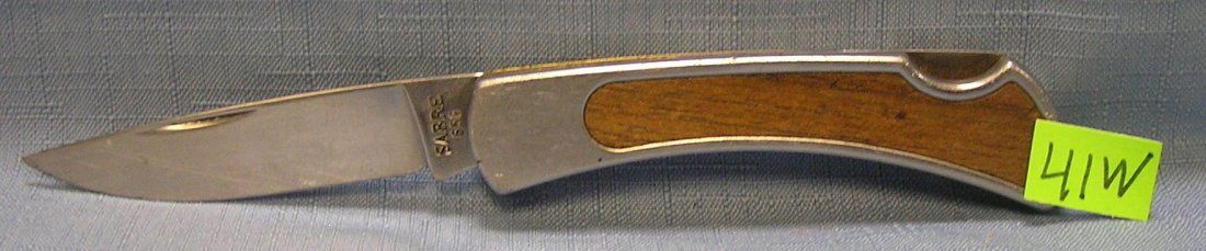 Vintage 7 inch pocket knife by Sabre: Vintage 7 inch pocket knife by Sabre est. value $25.00-$30.00