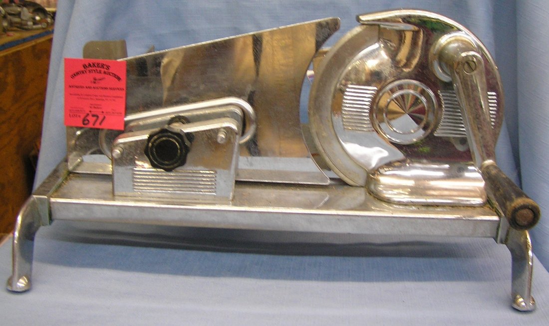 Vintage stainless steel meat slicer: Vintage stainless steel meat slicer est. value $35.00-$45.00