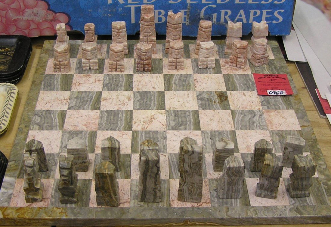 Solid marble chess set: Solid marble chess set with carved marble playing pieces est. value $150.00-$200.00