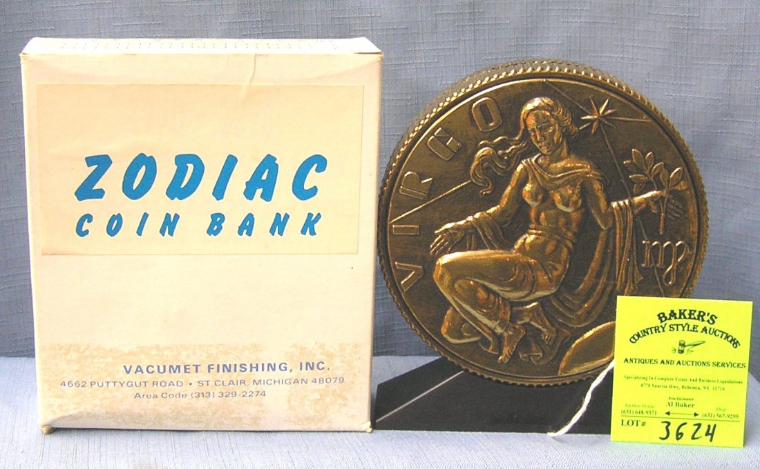 Vintage cast metal zodiac bank Virgo with original box: Vintage cast metal zodiac bank Virgo with original box est. value $65.00-$75.00