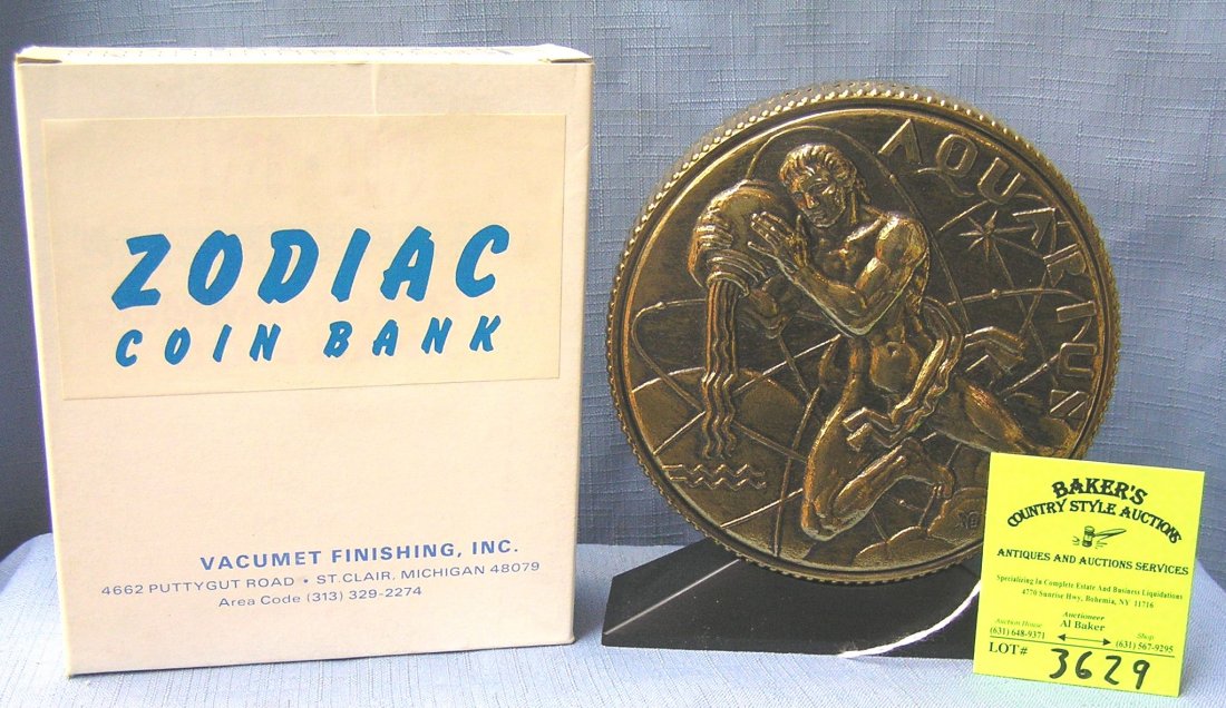 Vintage cast metal zodiac bank Aquarius with original: Vintage cast metal zodiac bank Aquarius with original box est. value $65.00-$75.00