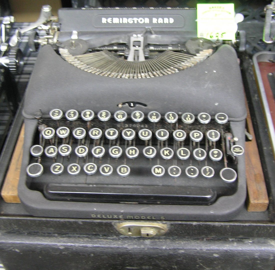Antique Remington Rand typewriter with original case: Antique Remington Rand typewriter with original case est. value $150.00-$200.00