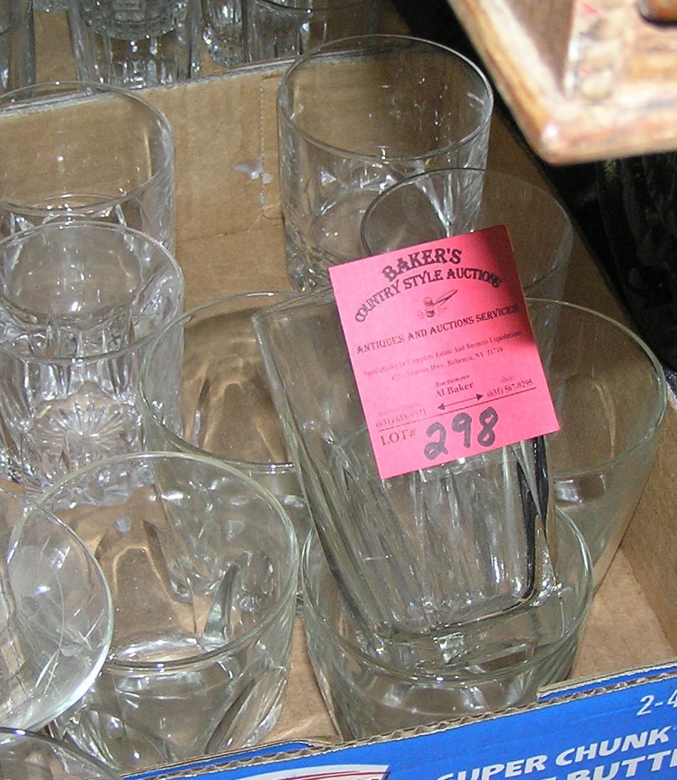 Box full of vintage glass and crystal drinking glasses: Box full of vintage glass and crystal drinking glasses est. value $25.00-$30.00