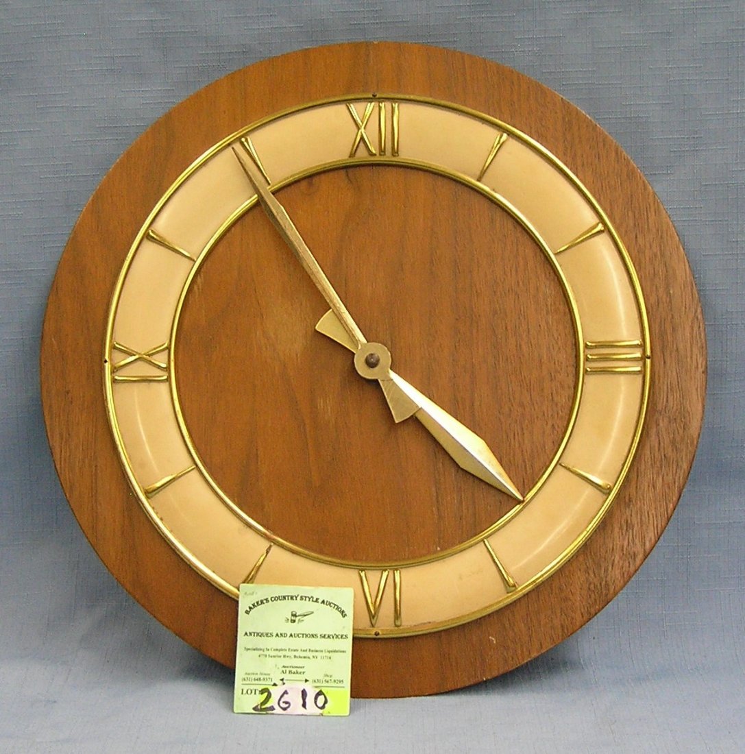 Vintage German made wall clock brass with oak base: Vintage German made wall clock brass with oak base est. value $40.00-$60.00