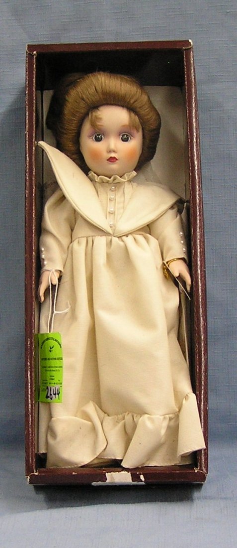 Vintage porcelain Catharine doll by Gibson from the: Vintage 14 inch porcelain Catharine doll by Gibson from the Danbury mint with original box est. value $50.00-$75.00