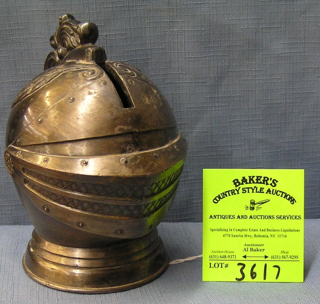Vintage cast metal knight in shining armor bank: Vintage cast metal knight in shining armor bank est. value $50.00-$75.00