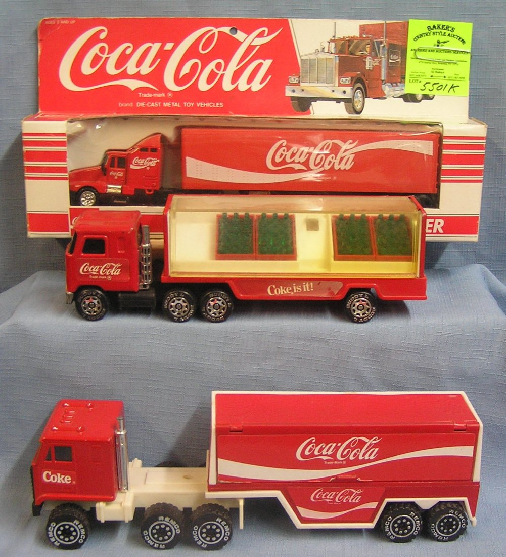 three vintage coca-cola advertising delivery trucks: Group of three vintage coca-cola advertising delivery trucks one with original box $50.00-$75.00