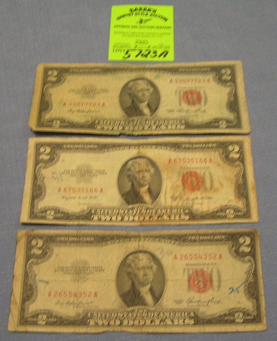 Group of vintage red seal US two dollar bills: Group of vintage red seal US two dollar bills circa 1950's $30.00-$35.00
