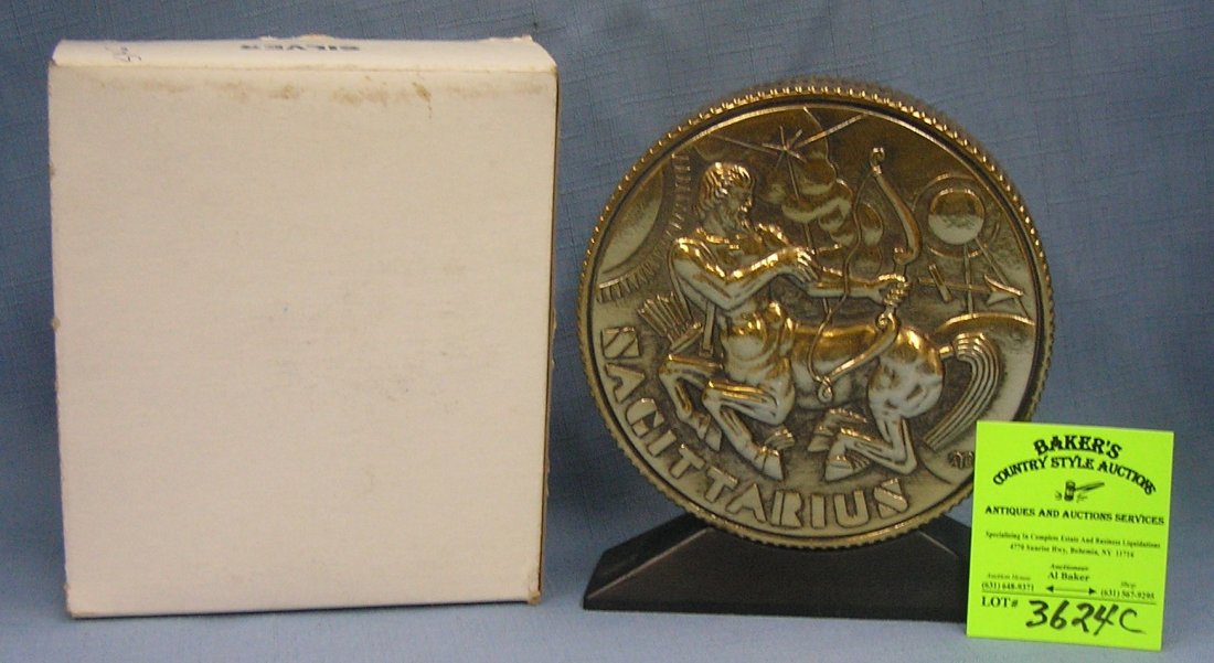 Vintage cast metal zodiac bank Sagittarius with: Vintage cast metal zodiac bank Sagittarius with original box est. value $65.00-$75.00