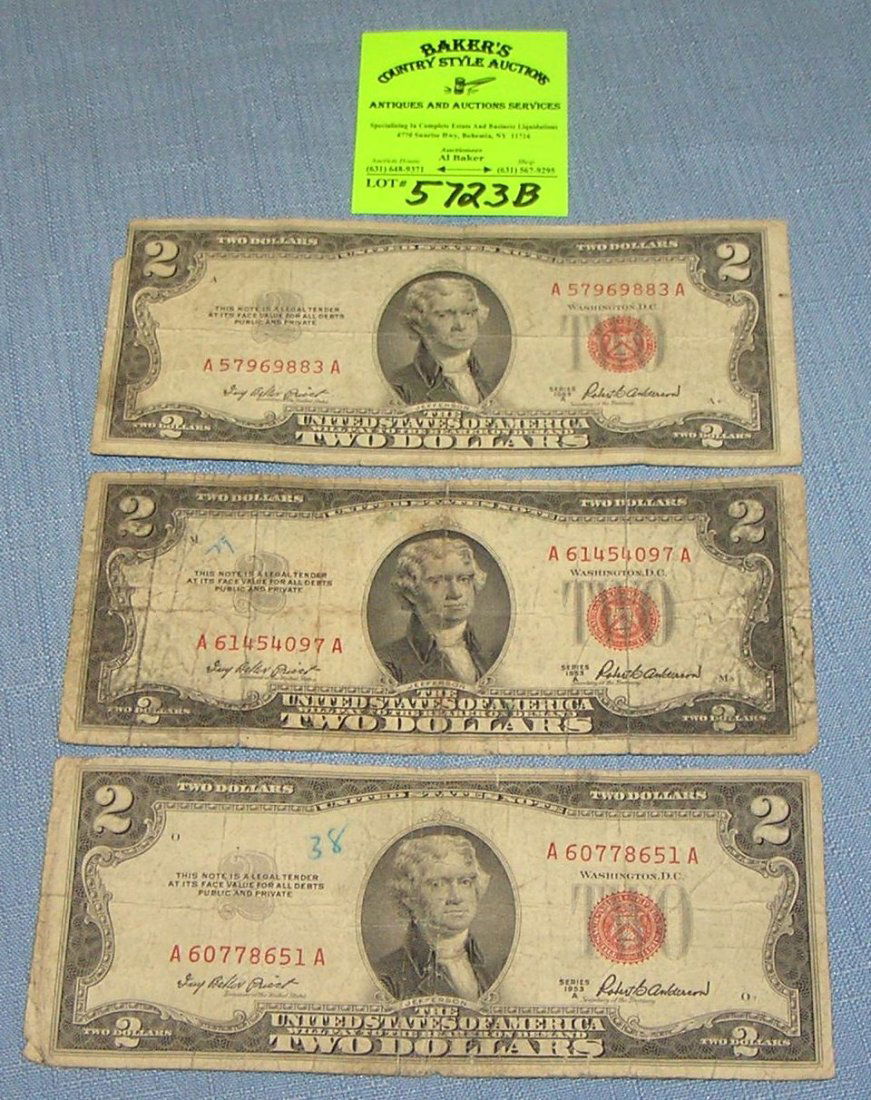 Group of vintage red seal US two dollar bills: Group of vintage red seal US two dollar bills circa 1950's $30.00-$35.00