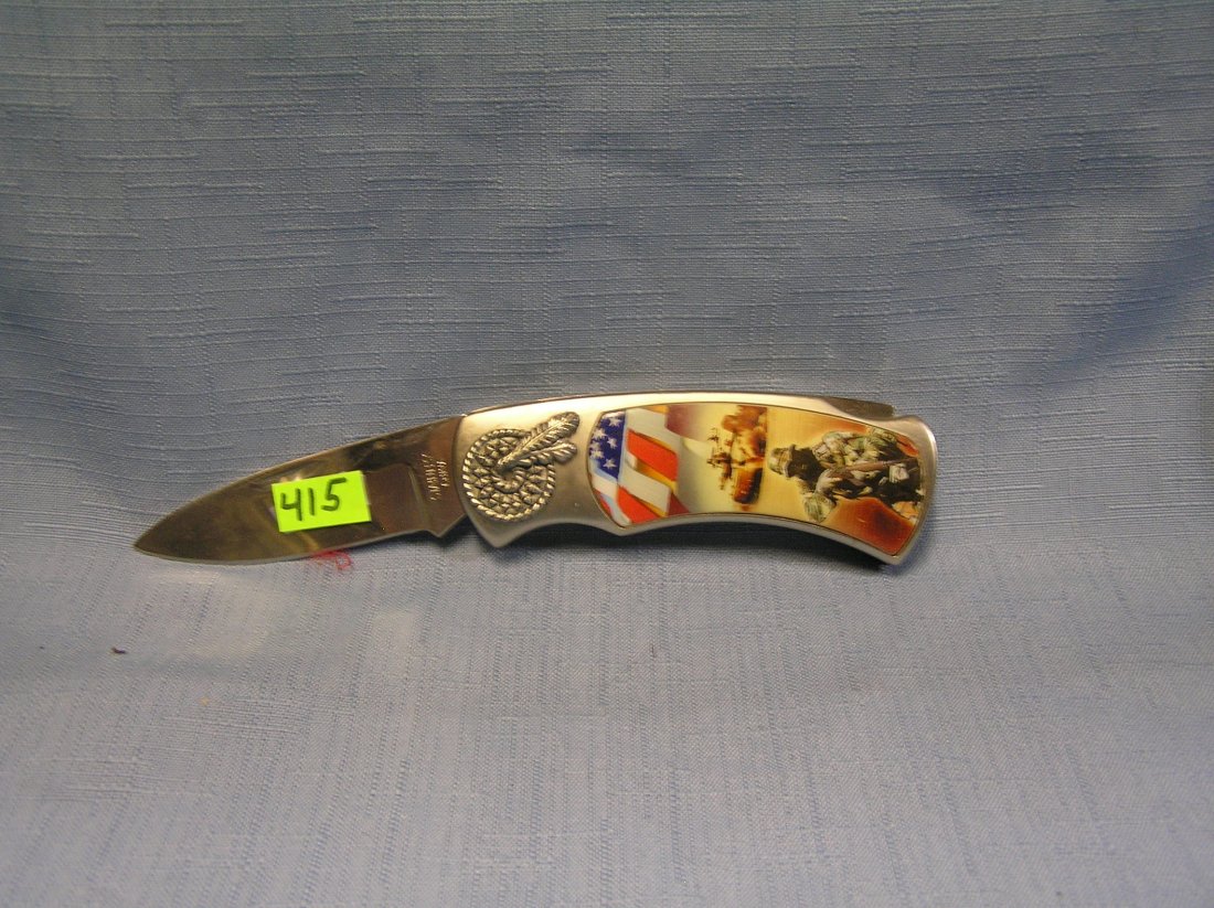 Military Desert Storm style pocket knife mint: Military Desert Storm style pocket knife mint est. value $30.00-$40.00