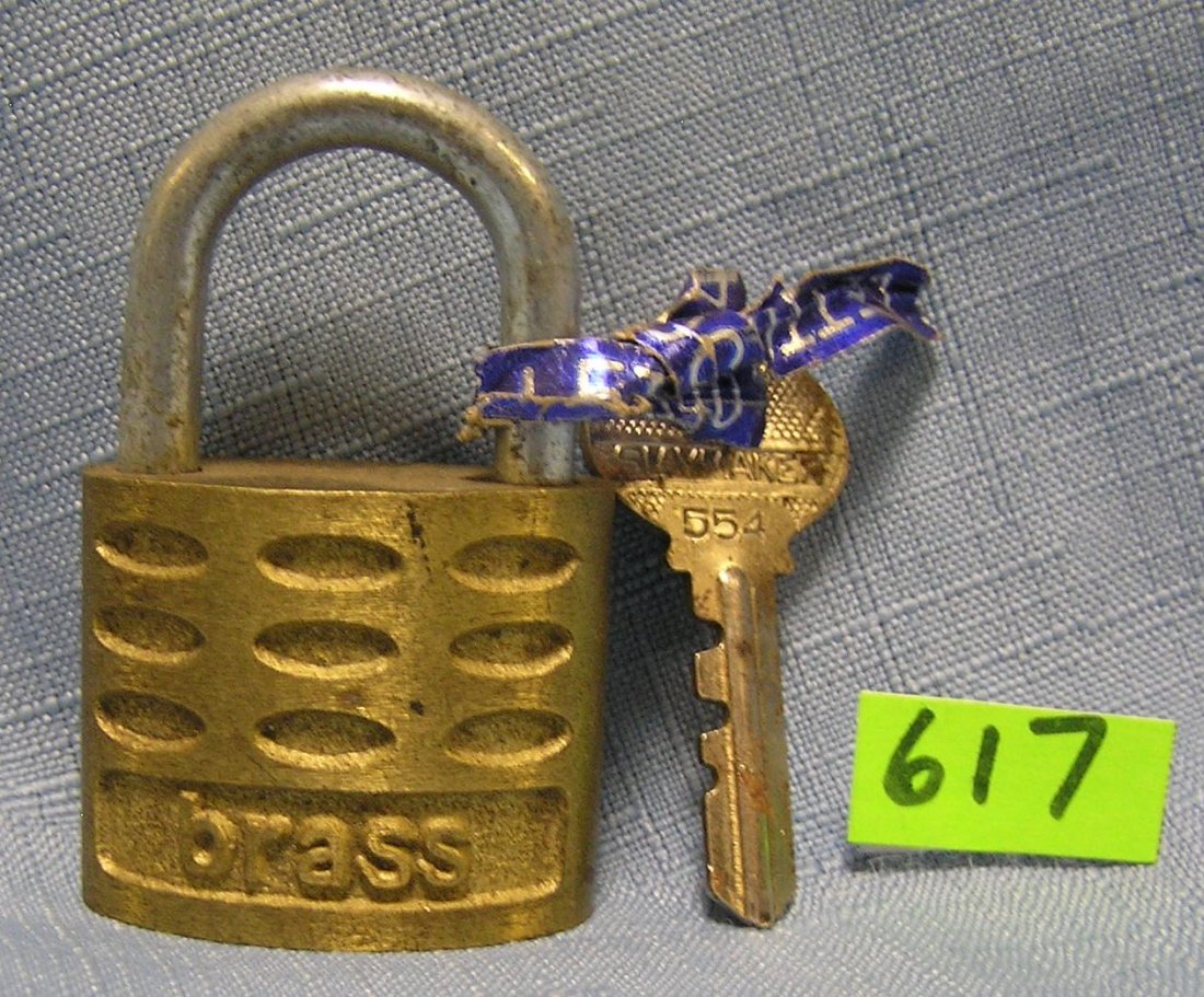 Vintage brass pad lock by Slayco with original key: Vintage brass pad lock by Slayco with original key est. value $25.00-$30.00