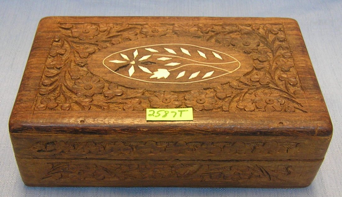 Vintage carved oak jewelry box: Vintage carved oak jewelry box with inlaid floral design est. value $25.00-$35.00