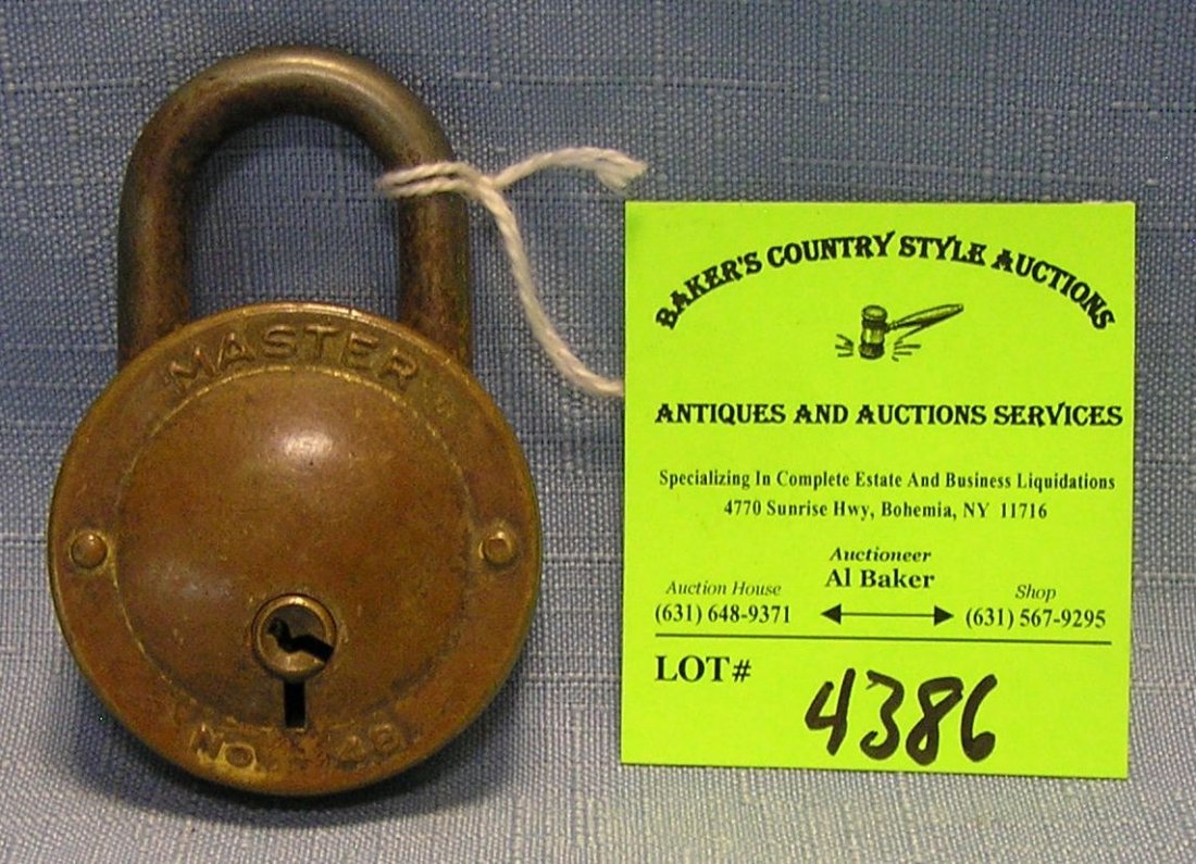 Early brass and iron Master lock with key mechanism: Early brass and iron Master lock with key mechanism $40.00-$60.00