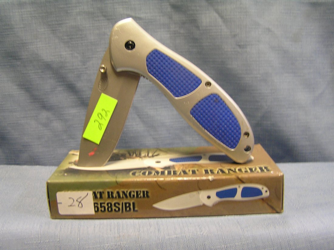 Combat ranger pocket knife mint in original box: Combat ranger pocket knife mint in original box est. value $30.00-$40.00