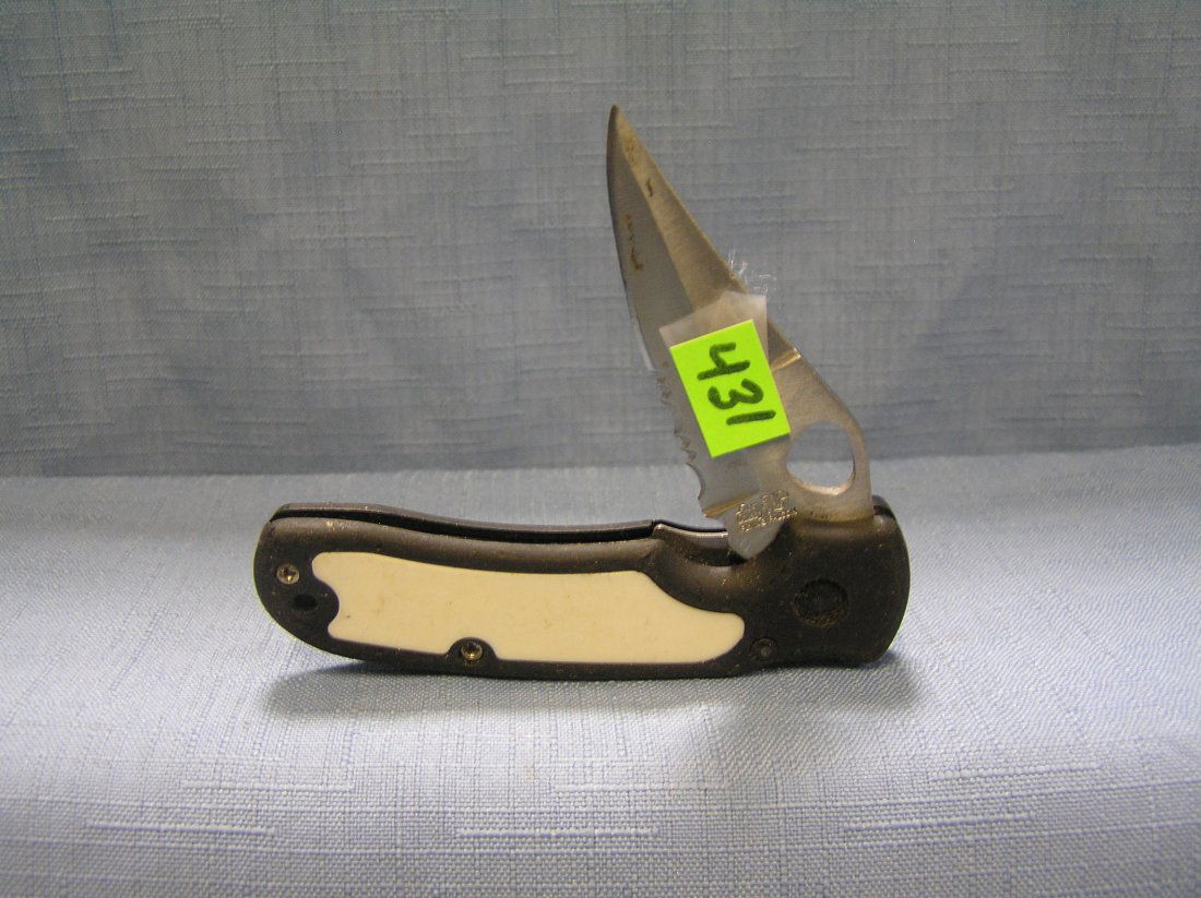 Folding pocket knife by Frost Cutlery: Folding pocket knife by Frost Cutlery est. value $15.00-$25.00