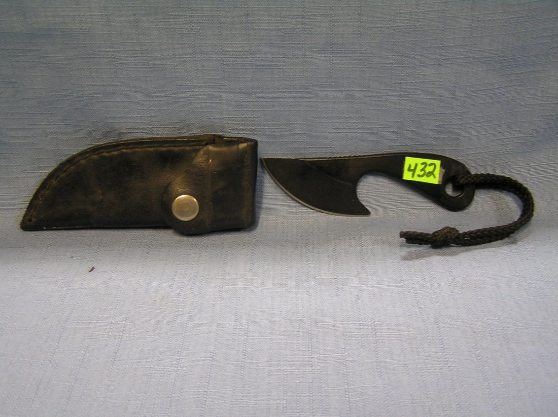 Quality throwing/fighting knife with leather case: Quality throwing/fighting knife with leather case est. value $30.00-$40.00
