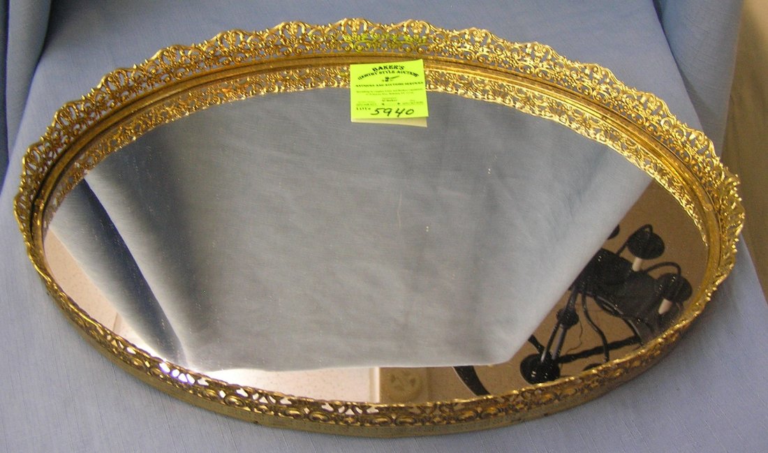 Large gold and brass trimmed mirrored vanity tray: Large gold and brass trimmed mirrored vanity tray $50.00-$60.00
