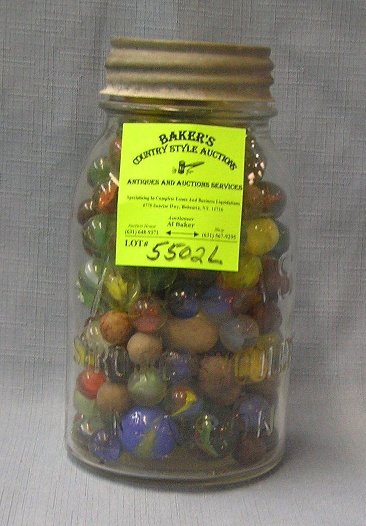 Large antique glass jar full of vintage marbles: Large antique glass jar full of vintage marbles est. value $80.00-$100.00