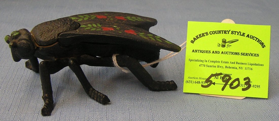 Hand painted cast iron bug shaped hinged storage: Hand painted cast iron bug shaped hinged storage container circa 1950’s $50.00-$60.00