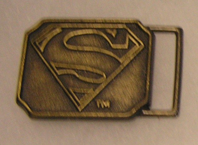 Vintage DC comics solid brass Superman belt bucklet: Vintage DC comics solid brass Superman belt bucklet $40.00-$50.00