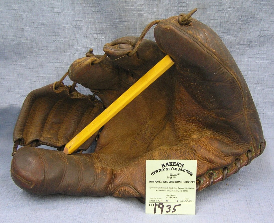 Antique leather baseball glove: Antique leather baseball glove est. value $100.00-$125.00