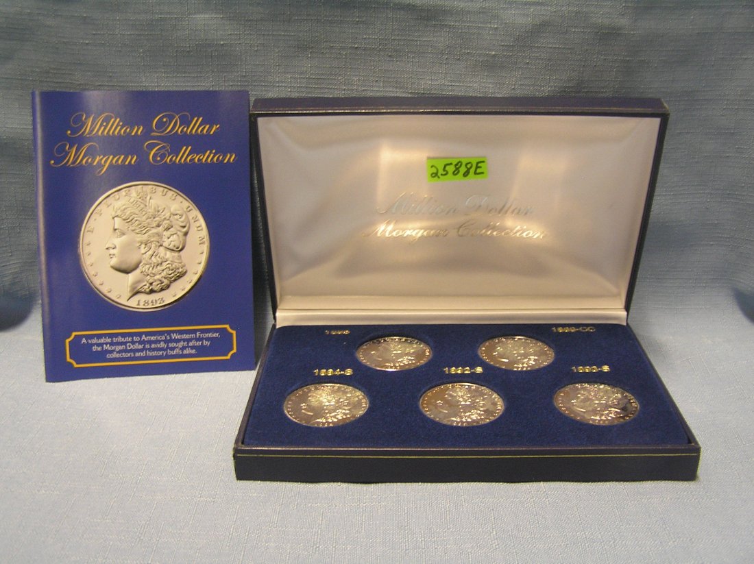Million dollar Morgan silver dollar collection: Million dollar Morgan silver dollar collection complete 5 piece silver clad Morgan dollar collection in presentation case, with original booklet and box est. value $250.00-$300.00