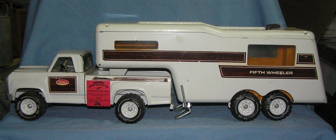 Tonka pick up truck and 5th wheeler travel camper: Tonka pick up truck and 5th wheeler travel camper with retractable sun roof est. value $50.00-$60.00