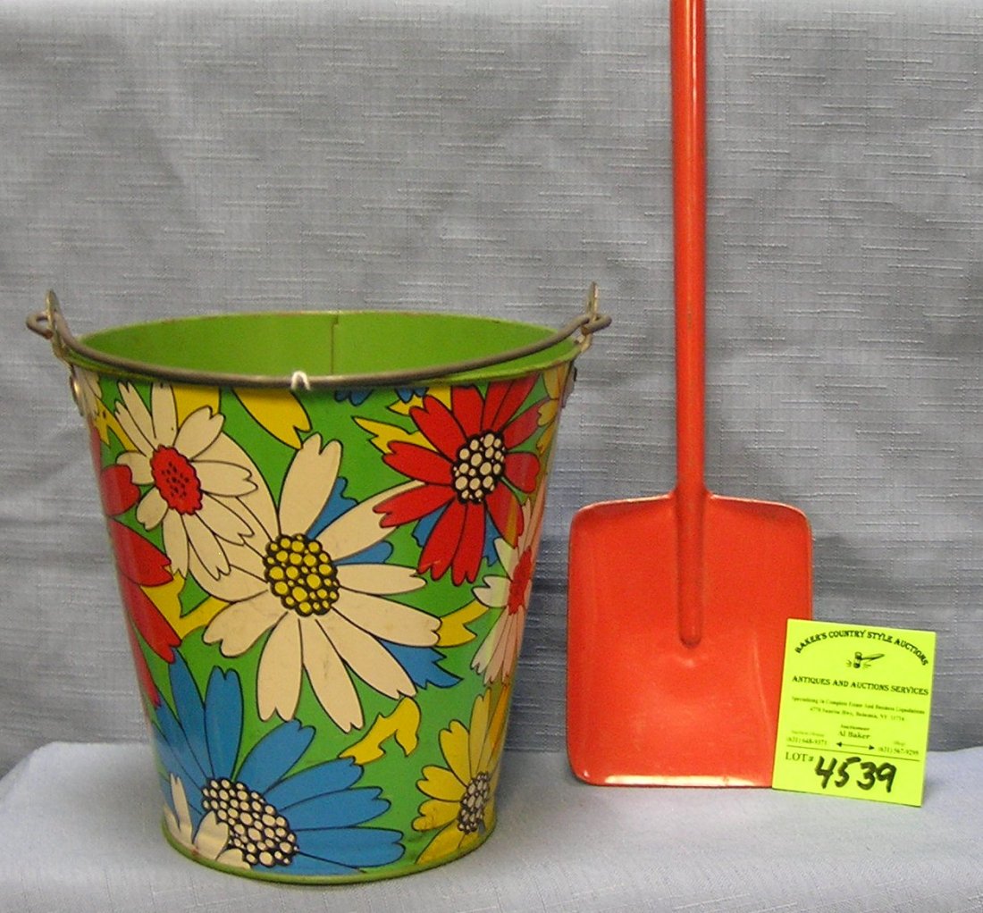 Vintage all tin child’s sand pail and shovel set: Vintage all tin child’s sand pail and shovel set floral decorated $50.00-$65.00