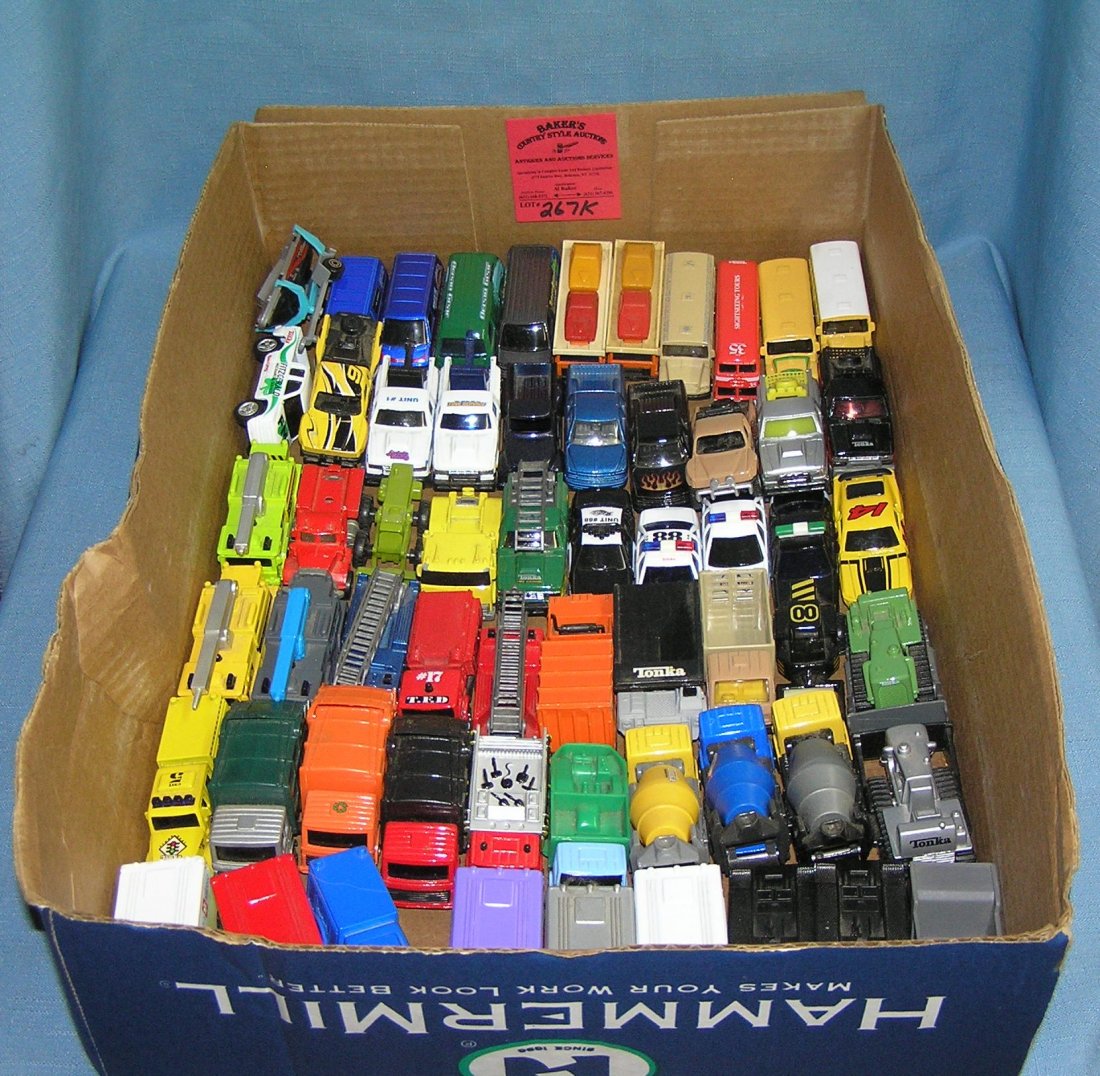 Box full of vintage Tonka toy cars and trucks: Box full of vintage Tonka toy cars and trucks est. value $75.00-$100.00