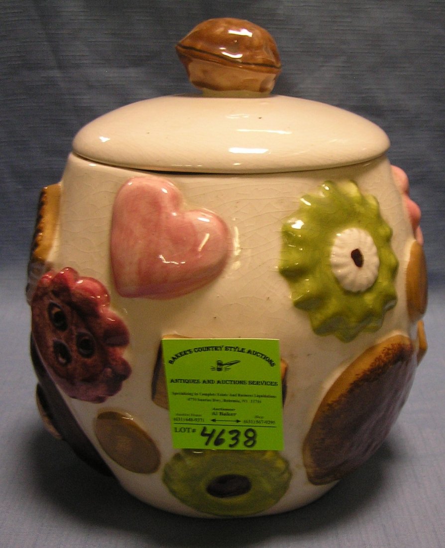 Vintage cookie decorated cookie jar: Vintage cookie decorated cookie jar with peanut lid by American pottery company $125.00-$175.00