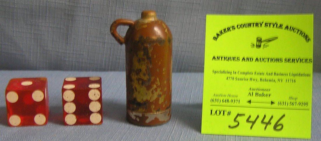 Group of gambling dice and a souvenir jug full of: Group of gambling dice and a souvenir jug full of miniature dice $25.00-$30.00