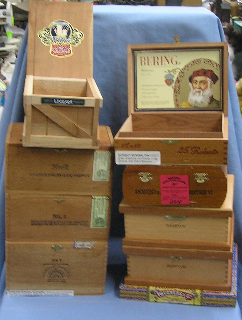 Group of quality wooden cigar boxes: Group of quality wooden cigar boxes est. value $50.00-$75.00